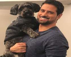 He has also adopted a Havanese-Schnauzer rescue dog whom he calls as Freddy.